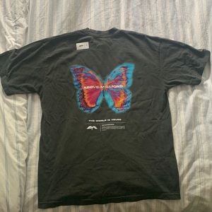 Above Millions holographic Metamorphosis Shirt